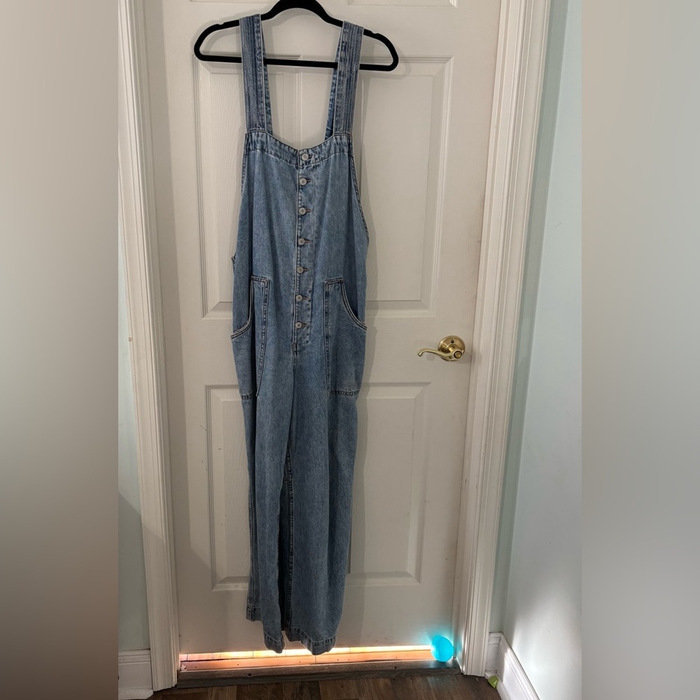 We The Free field of flowers but on front overalls - Light Blue Denim Jumpsuit